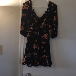 Worn once off the shoulder, large mini dress with ruffles